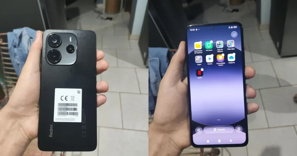 Pessoa segurando o celular Xiaomi Redmi Note 14, exibindo a parte traseira com câmeras triplas e a tela inicial com aplicativos abertos, ideal para quem procura um celular Android moderno e barato para comprar